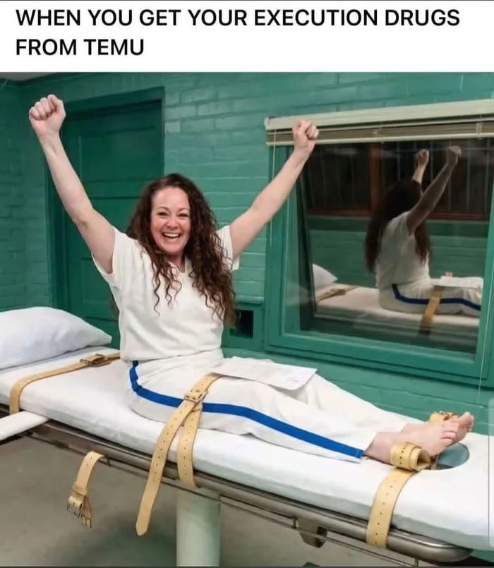 Still got it. Woman sitting on execution table with restraints, arms raised cheerfully, with mirror reflection visible. Text: WHEN YOU GET YOUR EXECUTION DRUGS FROM TEMU