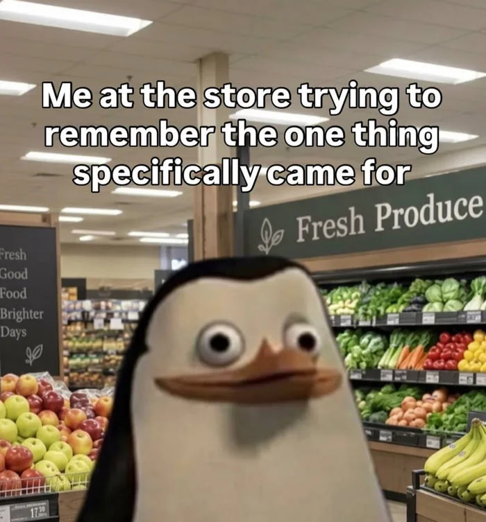 Brain cells left the chat. A confused cartoon character in a grocery store produce section with an uncertain expression. Text: Me at the store trying to remember the one thing specifically came for / Fresh Produce / Fresh Good Food Brighter Days