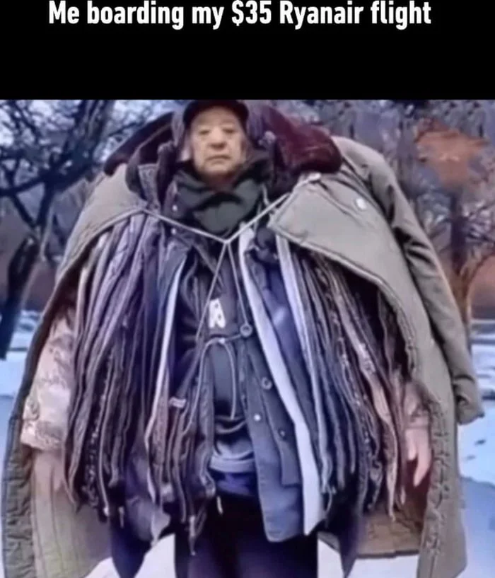 Person wearing multiple layered jackets and coats to avoid baggage fees on a budget airline flight. Text: Me boarding my $35 Ryanair flight