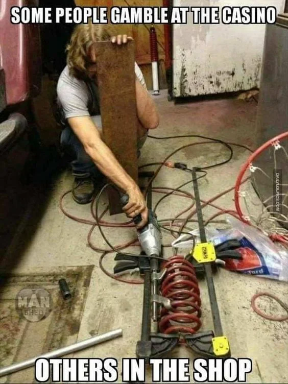 Gambler. A person crouched down working with tangled electrical cords and tools on the floor. Text: SOME PEOPLE GAMBLE AT THE CASINO / OTHERS IN THE SHOP