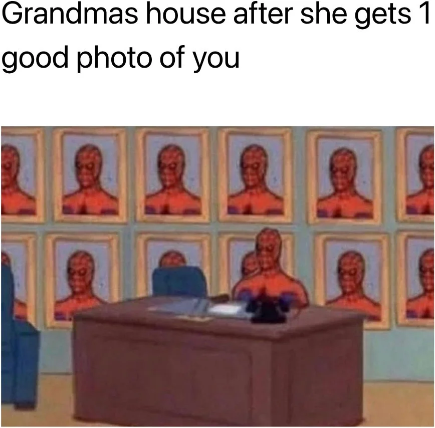 When grandma makes you a shrine. Spider-Man sitting at a desk surrounded by framed portraits of himself on the walls. Text: Grandmas house after she gets 1 good photo of you