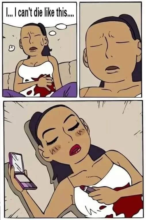 A woman says she can't die like this while applying makeup, implying vanity takes priority over survival. Text: I... I can't die like this