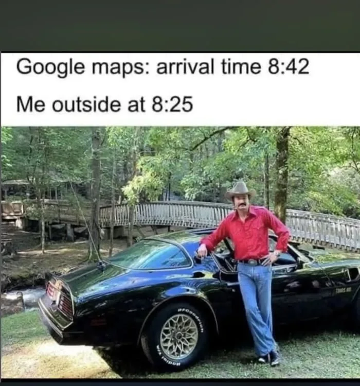 Ready to leave way too early just to be safe. Man in red shirt standing next to a sports car, arriving early to a destination. Text: Google maps: arrival time 8:42 / Me outside at 8:25