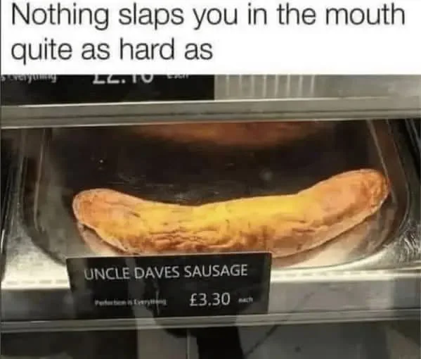 Rock solid breakfast. A sausage in a heated display case labeled 'Uncle Daves Sausage' priced at £3.30, used as a pun about impact. Text: Nothing slaps you in the mouth quite as hard as / UNCLE DAVES SAUSAGE / Perfection is Everything / £3.30 each