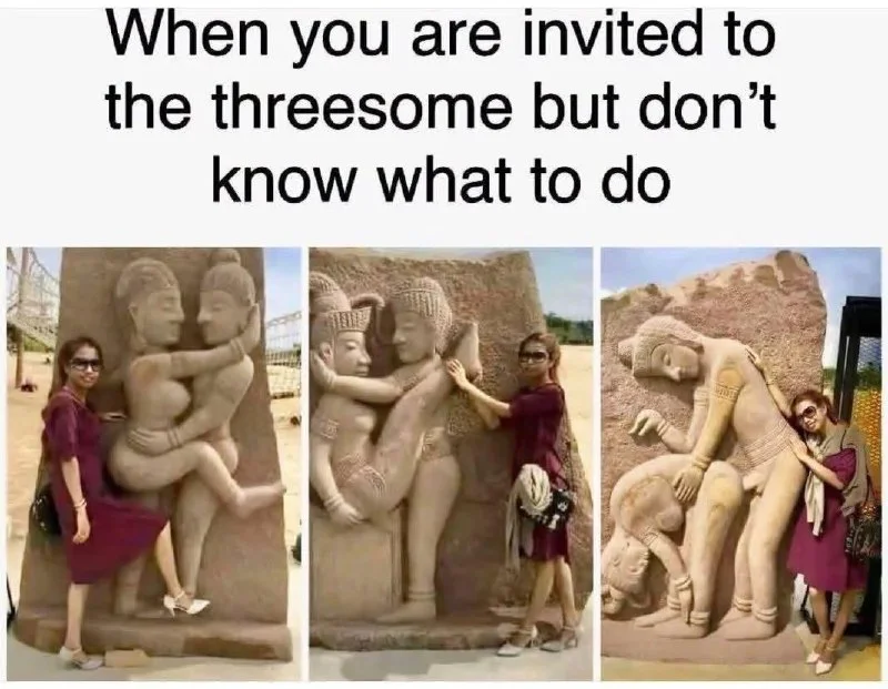 Woman posing awkwardly next to ancient stone sculptures depicting intimate scenes. Text: When you are invited to the threesome but don't know what to do