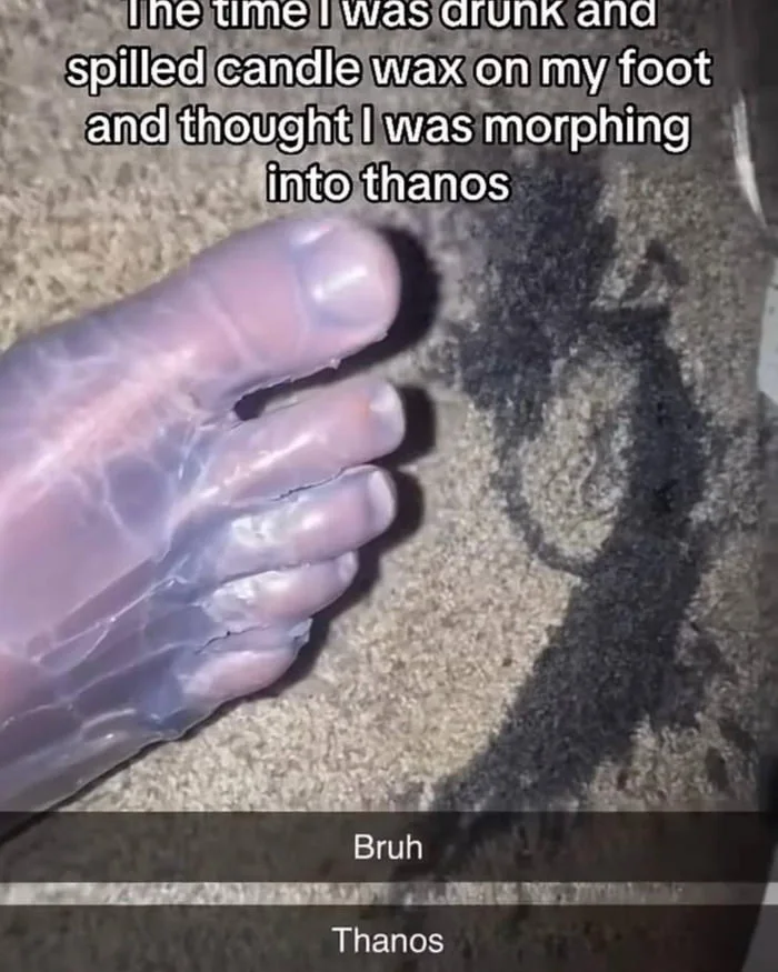 A foot covered in purple candle wax compared humorously to Thanos from Marvel. Text: The time I was drunk and spilled candle wax on my foot and thought I was morphing into thanos / Bruh / Thanos